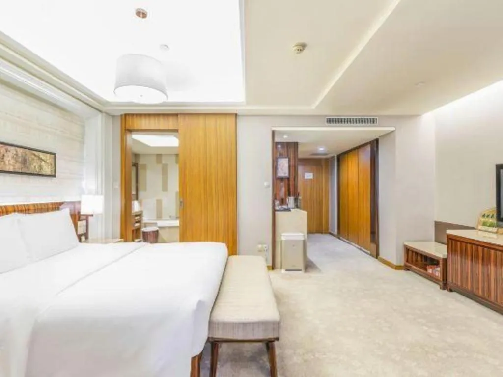 Bed in YUN-RAY Ambassador Hotel