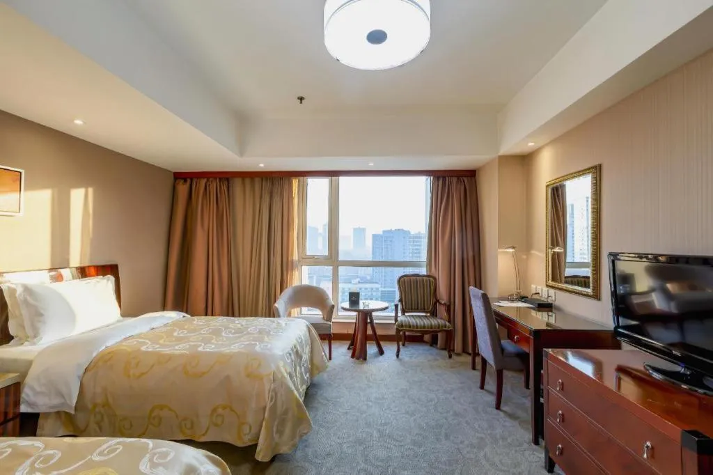 Bed in YUN-RAY Ambassador Hotel