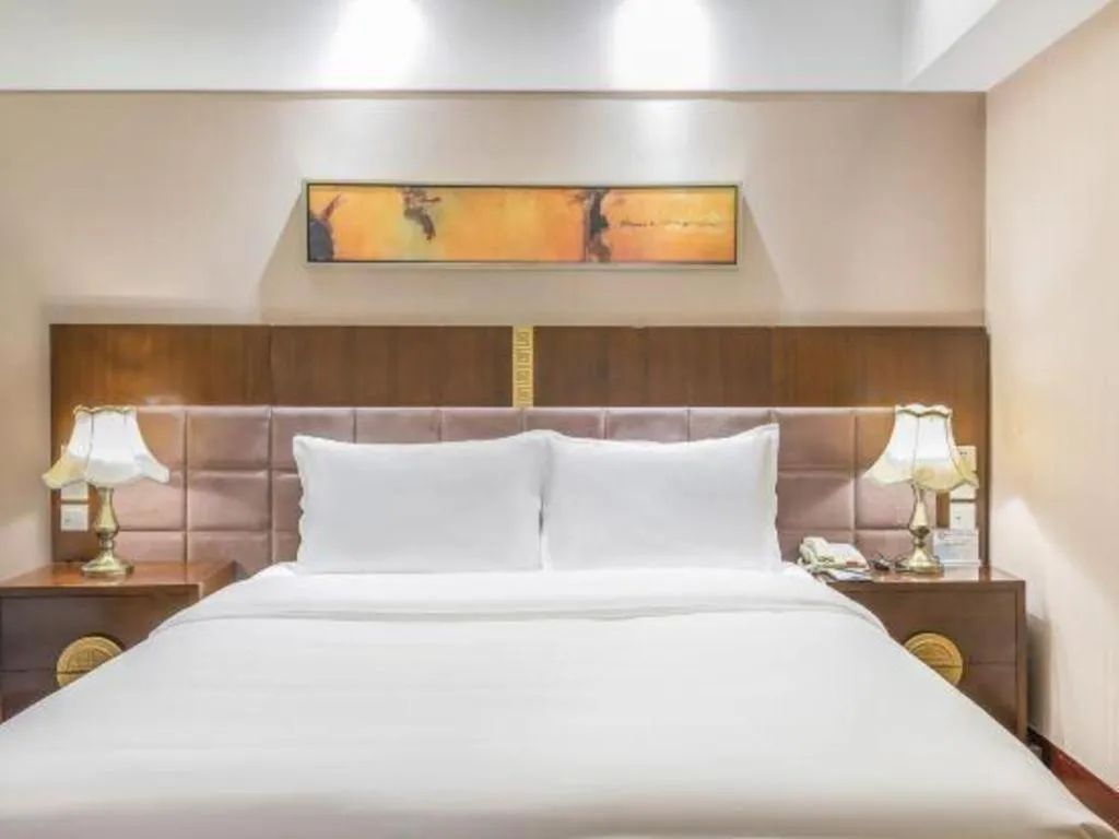 Bed in YUN-RAY Ambassador Hotel