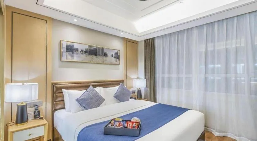 Bed in YUN-RAY Ambassador Hotel