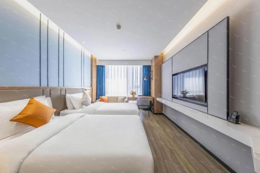 Bed in YUN-RAY Ambassador Hotel