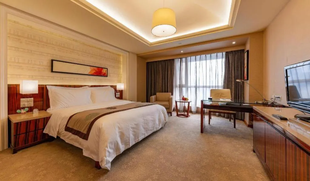 Bed in YUN-RAY Ambassador Hotel