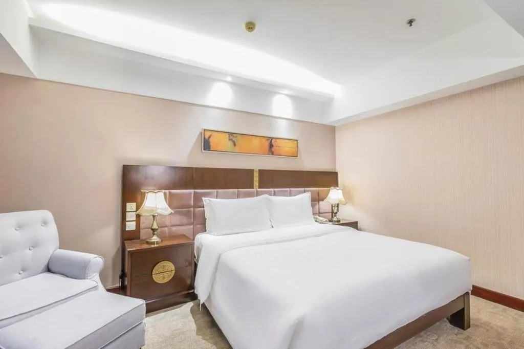 Bed in YUN-RAY Ambassador Hotel