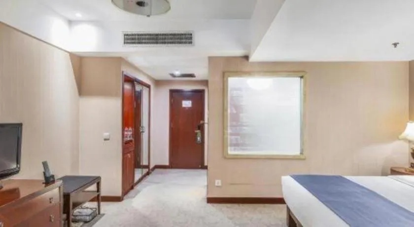 Bed in YUN-RAY Ambassador Hotel