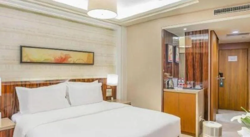 Bed in YUN-RAY Ambassador Hotel