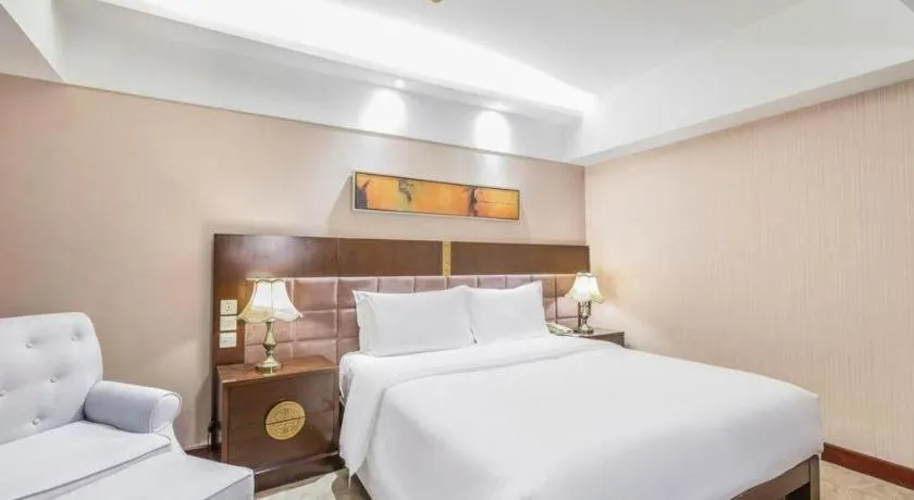 Bed in YUN-RAY Ambassador Hotel