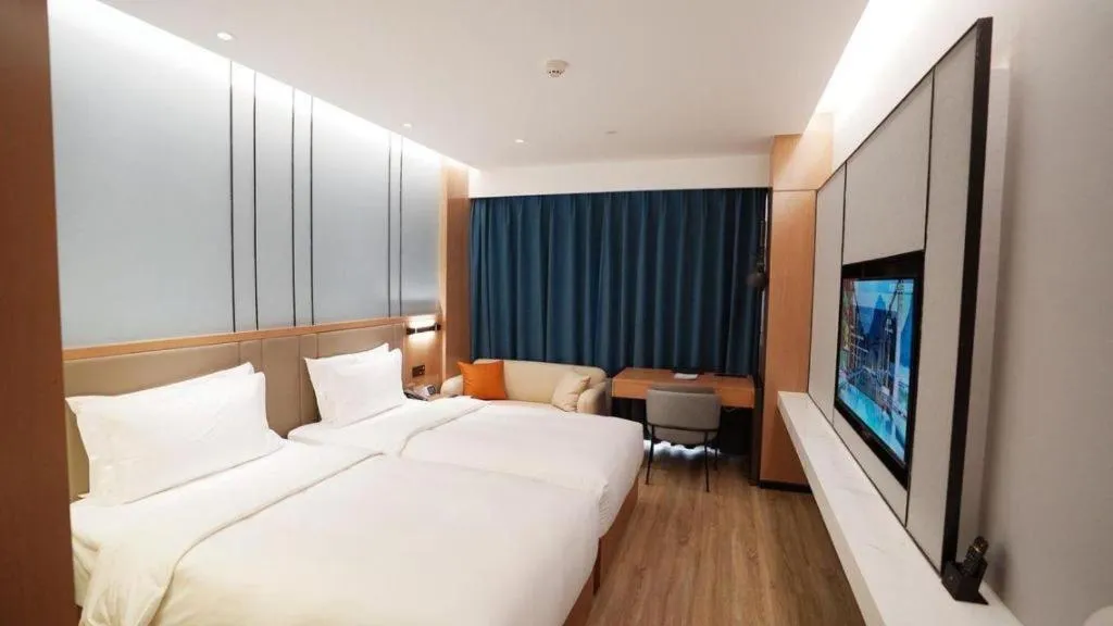 Bed in YUN-RAY Ambassador Hotel