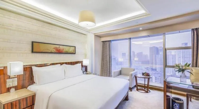 Bed in YUN-RAY Ambassador Hotel