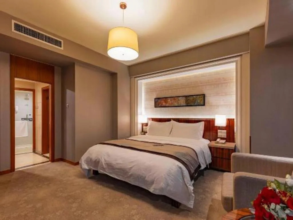 Bed in YUN-RAY Ambassador Hotel