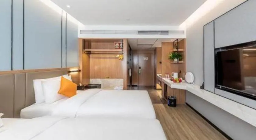 Bed in YUN-RAY Ambassador Hotel