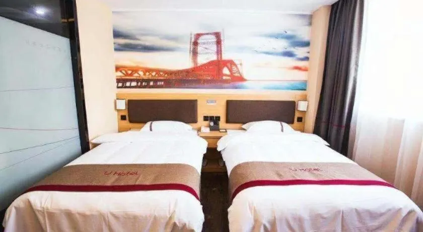 Bed in Thank Inn Hotel Guangdong Zhuhai Jiwan Hongqi Central Sqaure