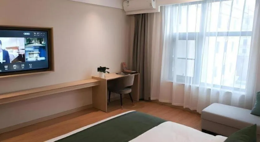 Bed in GreenTree Inn Express Hebei Tangshan Caofeidian Industrial Park 11 Plus Bus Station