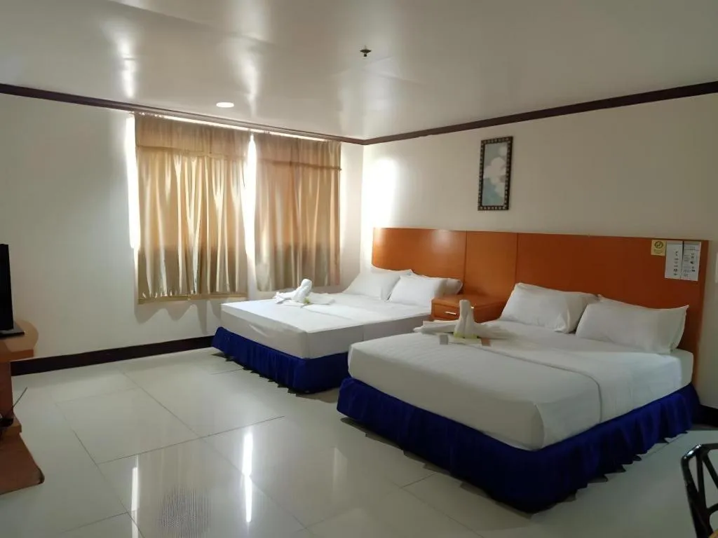 Bed in Jeamco Royal Hotel - Pasig