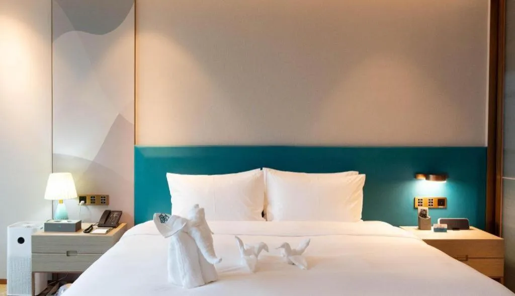 Bed in Zhuhai Hongsanyi Hotel