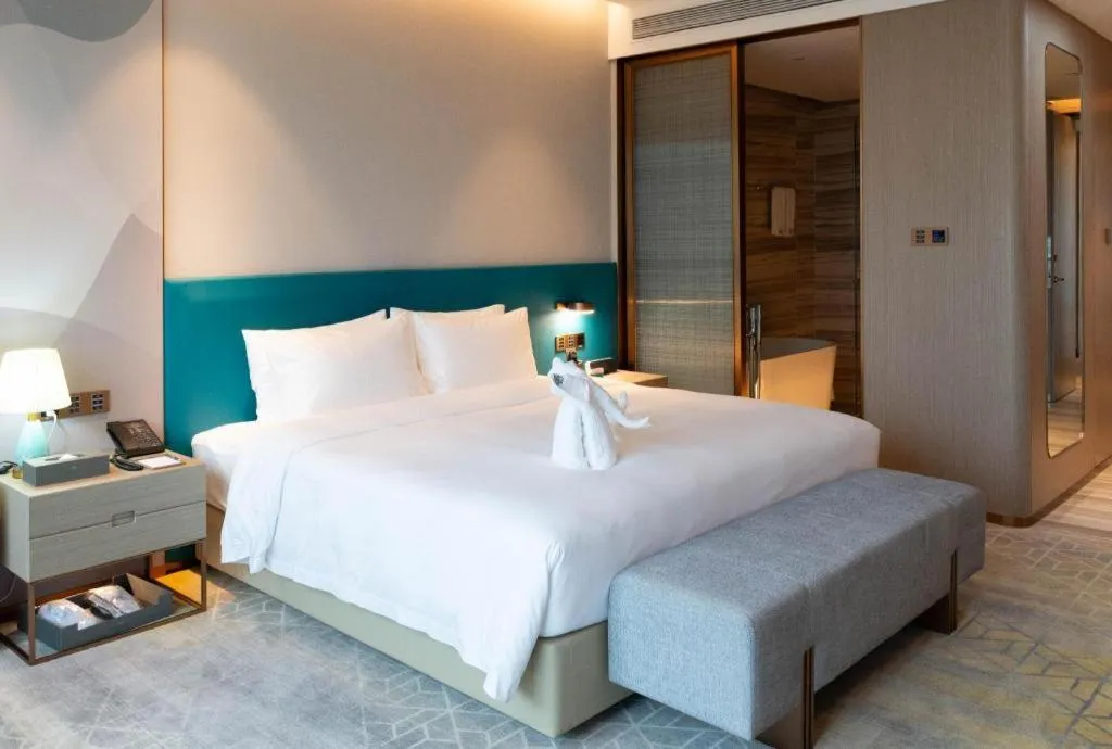 Bed in Zhuhai Hongsanyi Hotel