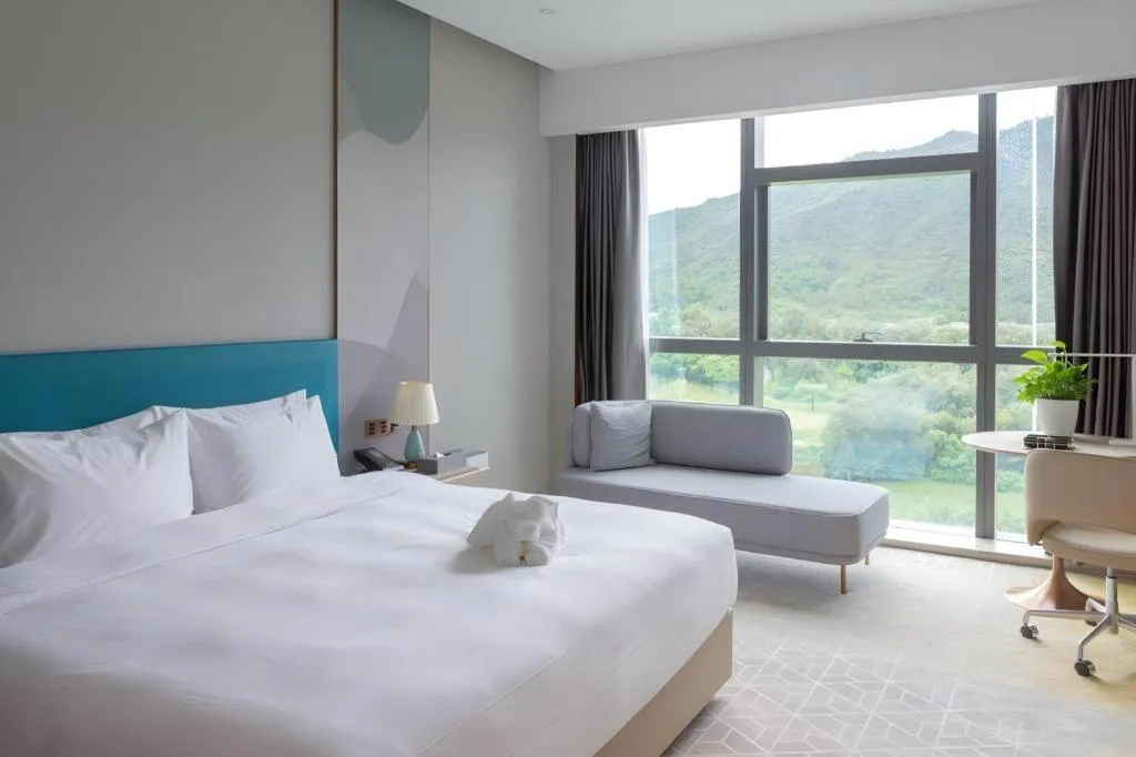 Bed in Zhuhai Hongsanyi Hotel