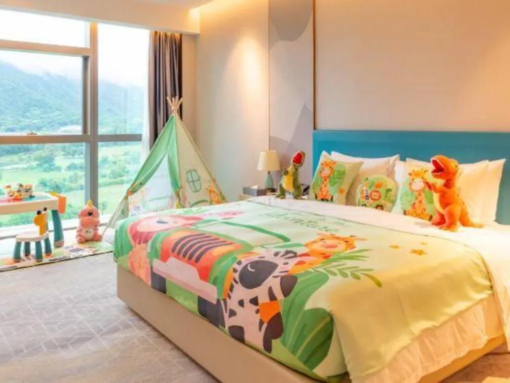 Bed in Zhuhai Hongsanyi Hotel