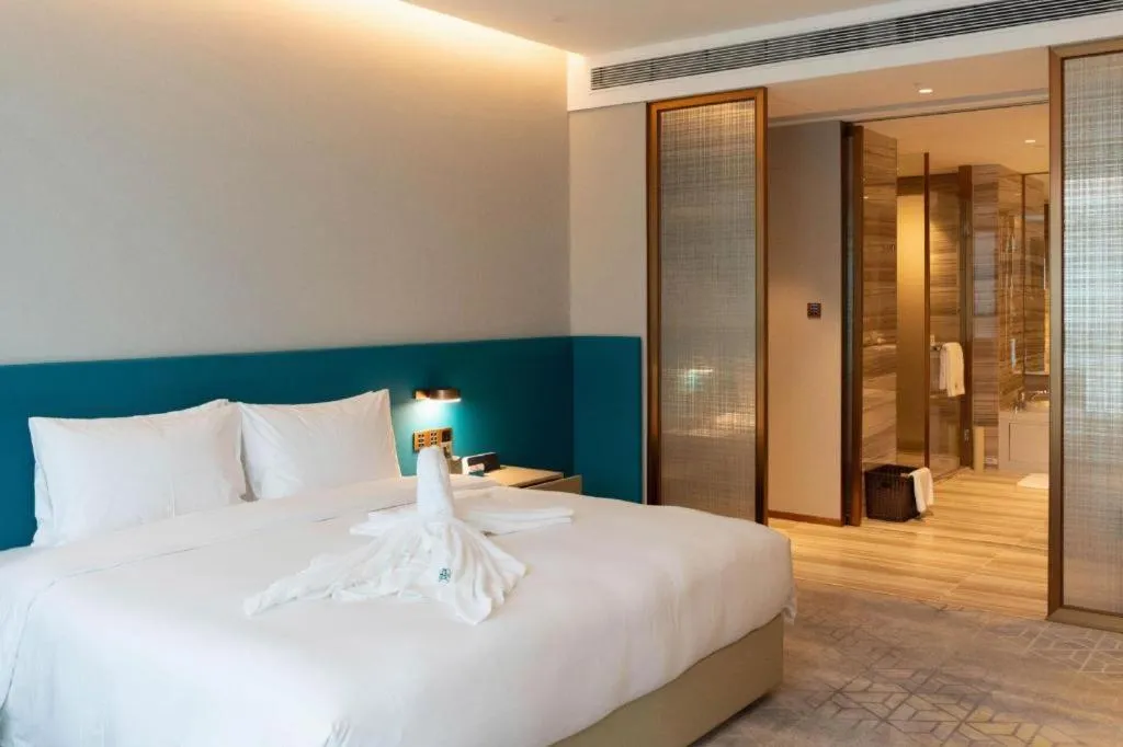 Bed in Zhuhai Hongsanyi Hotel