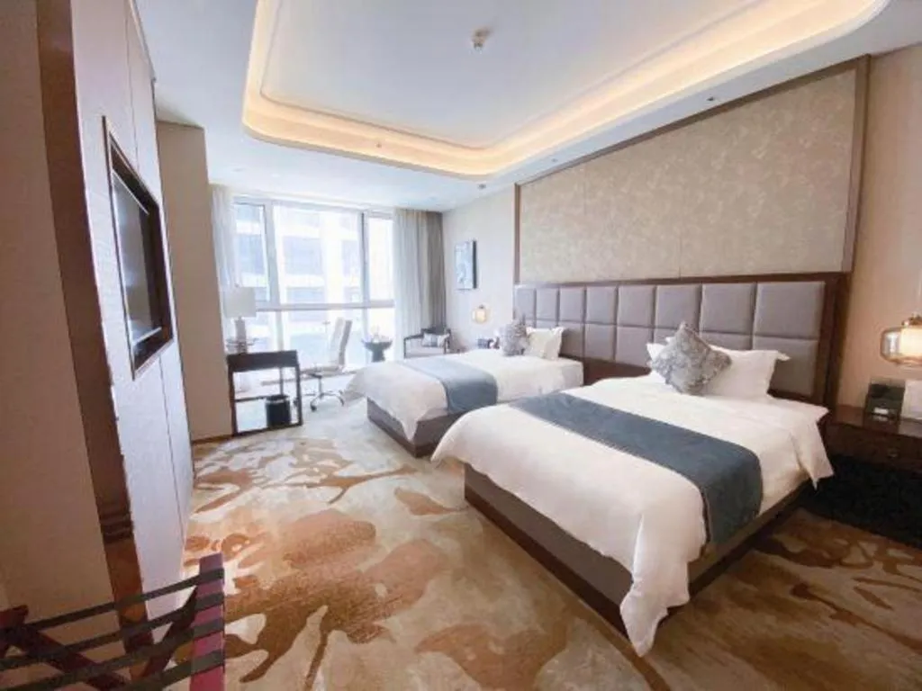 Bed in Qingdao Hualan Hotel