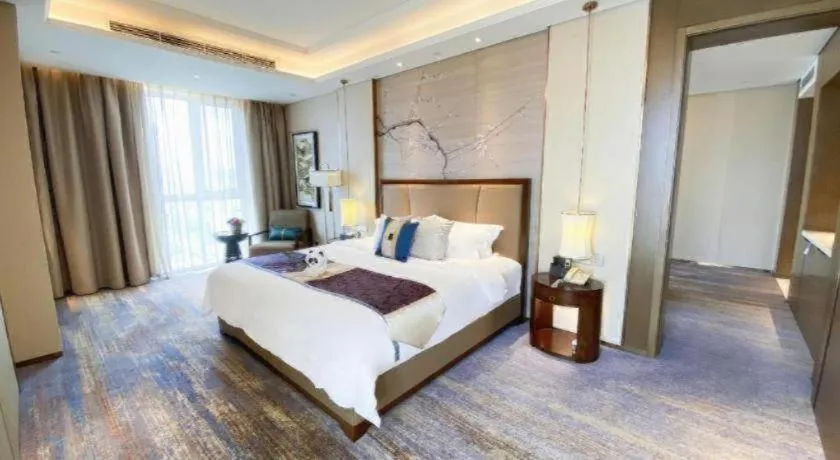 Bed in Qingdao Hualan Hotel