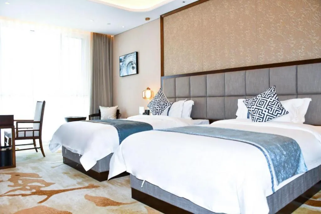 Bed in Qingdao Hualan Hotel