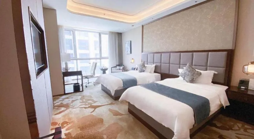 Bed in Qingdao Hualan Hotel