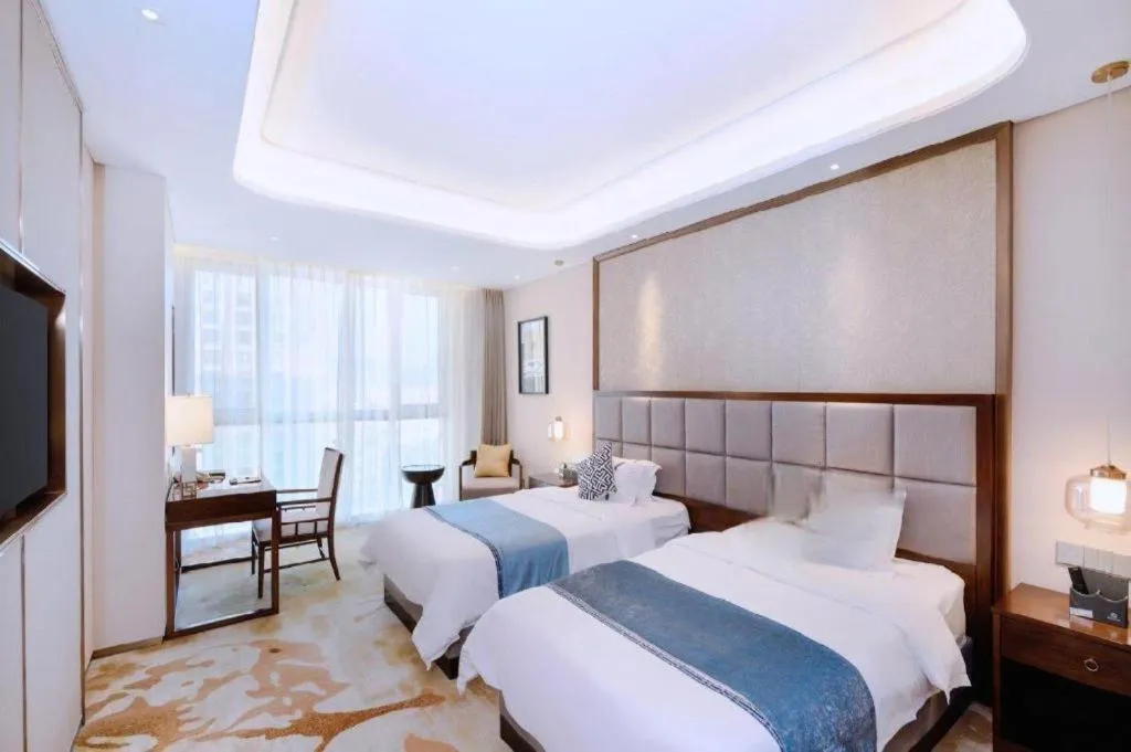 Bed in Qingdao Hualan Hotel