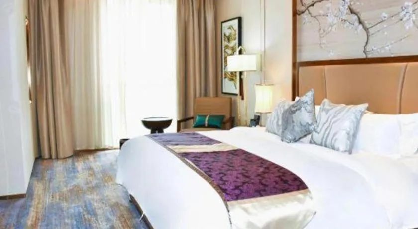 Bed in Qingdao Hualan Hotel