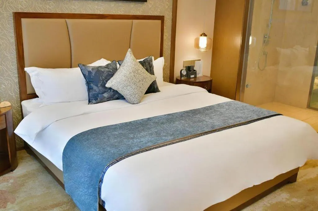 Bed in Qingdao Hualan Hotel