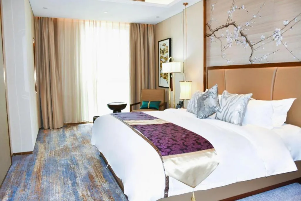 Bed in Qingdao Hualan Hotel