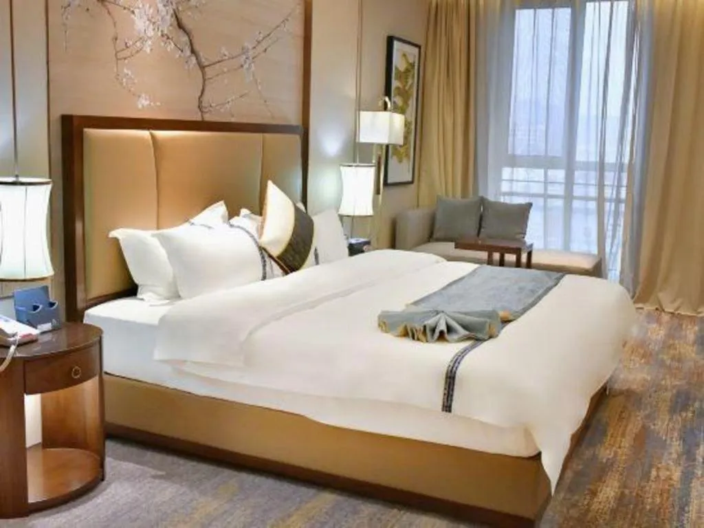 Bed in Qingdao Hualan Hotel