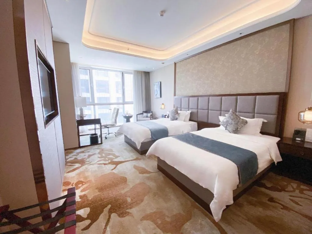 Bed in Qingdao Hualan Hotel