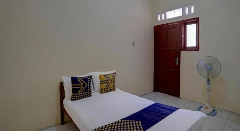 Bed in Hotel O Sunyoto Homestay Syariah