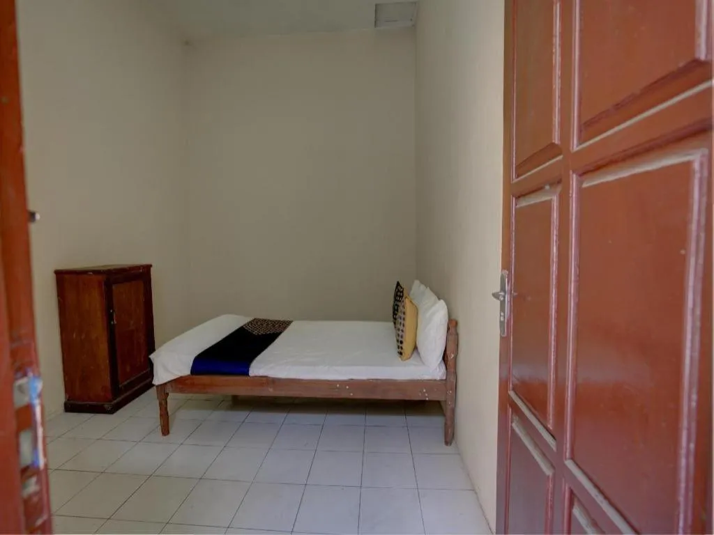 Bed in Hotel O Sunyoto Homestay Syariah