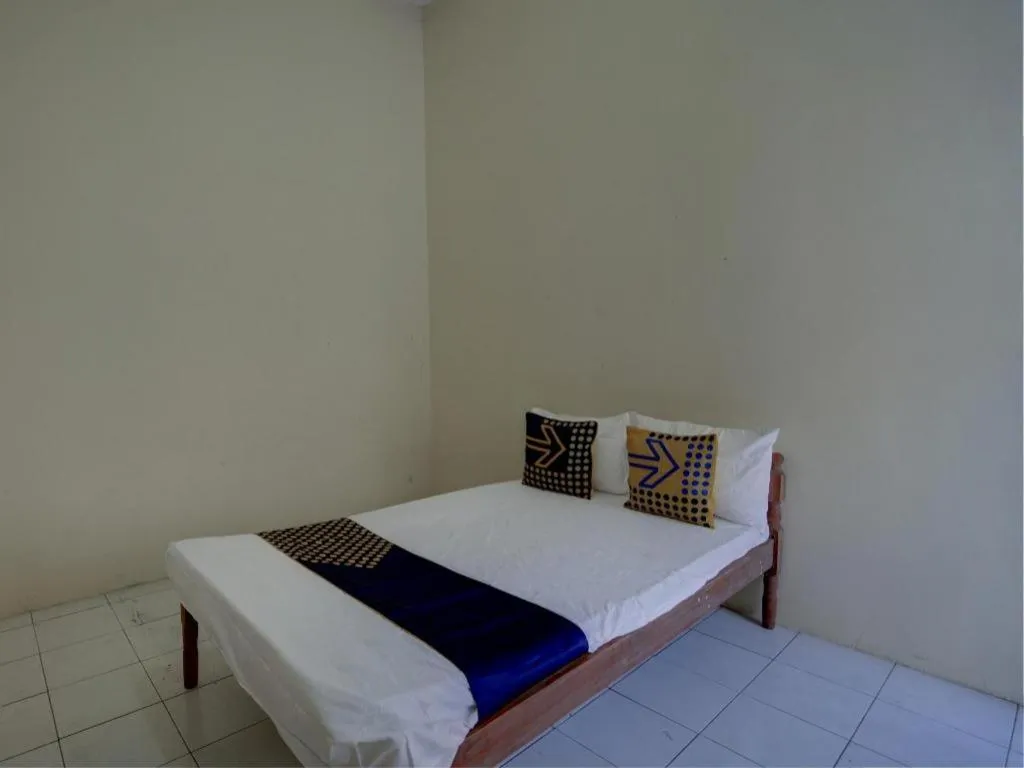 Bed in Hotel O Sunyoto Homestay Syariah