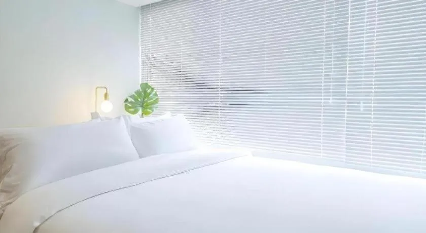 Bed in baseLITE-XINTIANDI Serviced Apartment