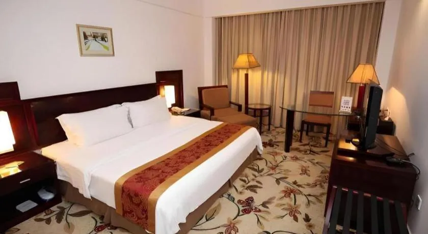 Bed in Hong Ye Hotel