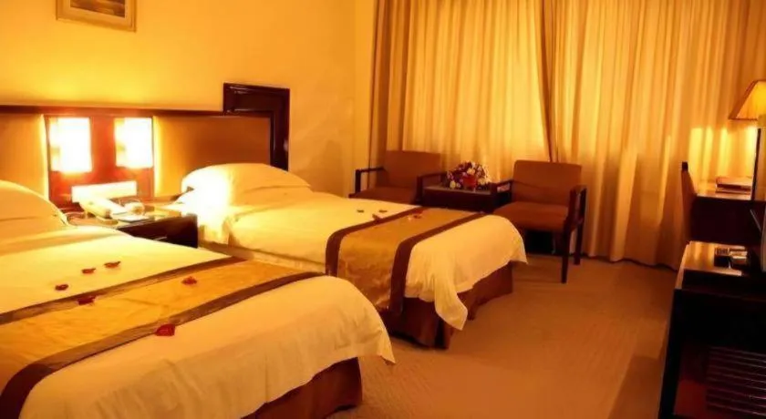 Bed in Hong Ye Hotel