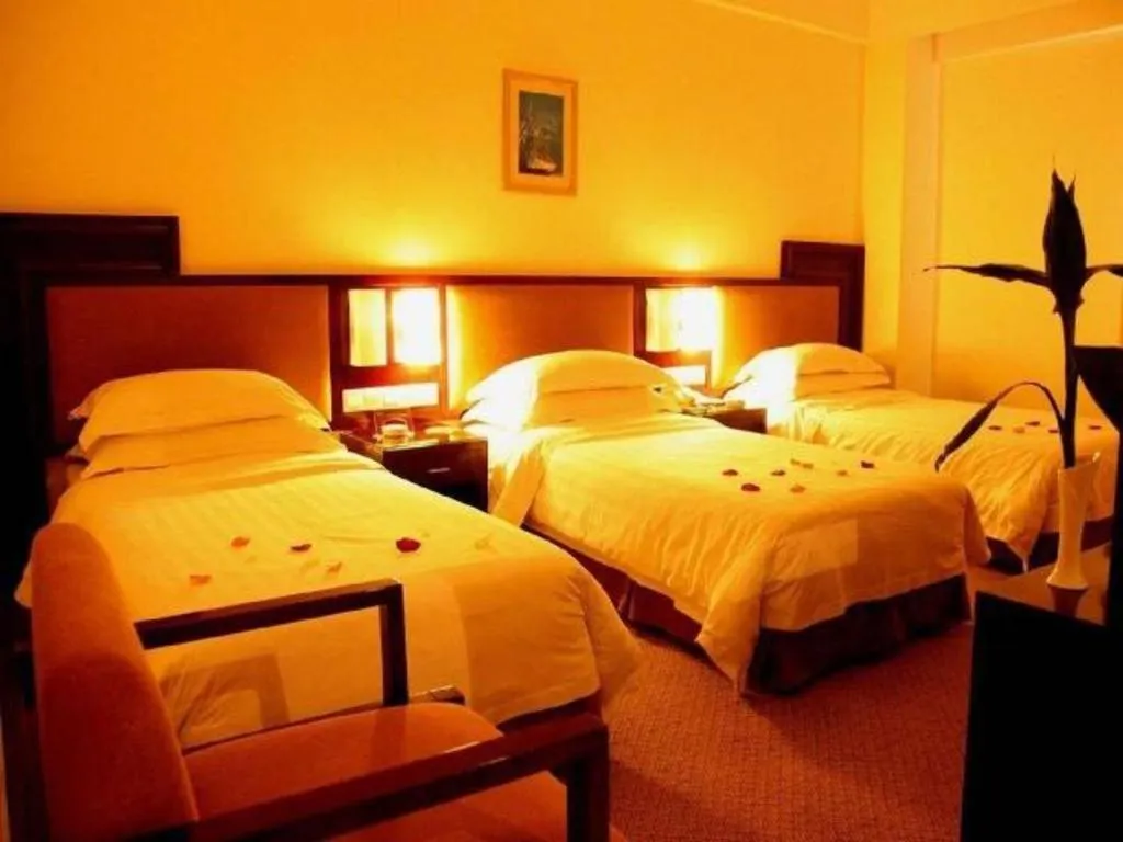 Bed in Hong Ye Hotel