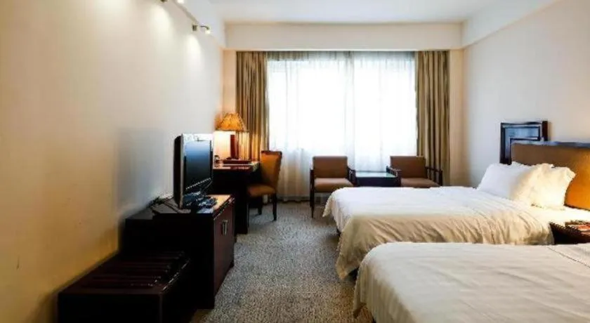 Bed in Hong Ye Hotel