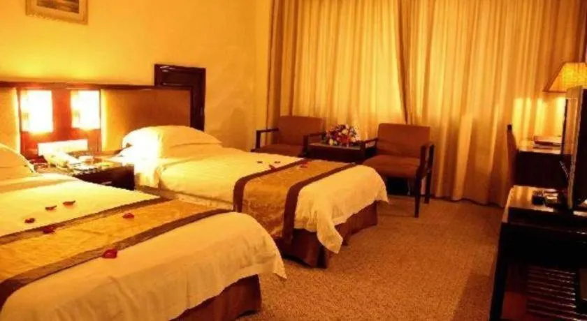 Bed in Hong Ye Hotel