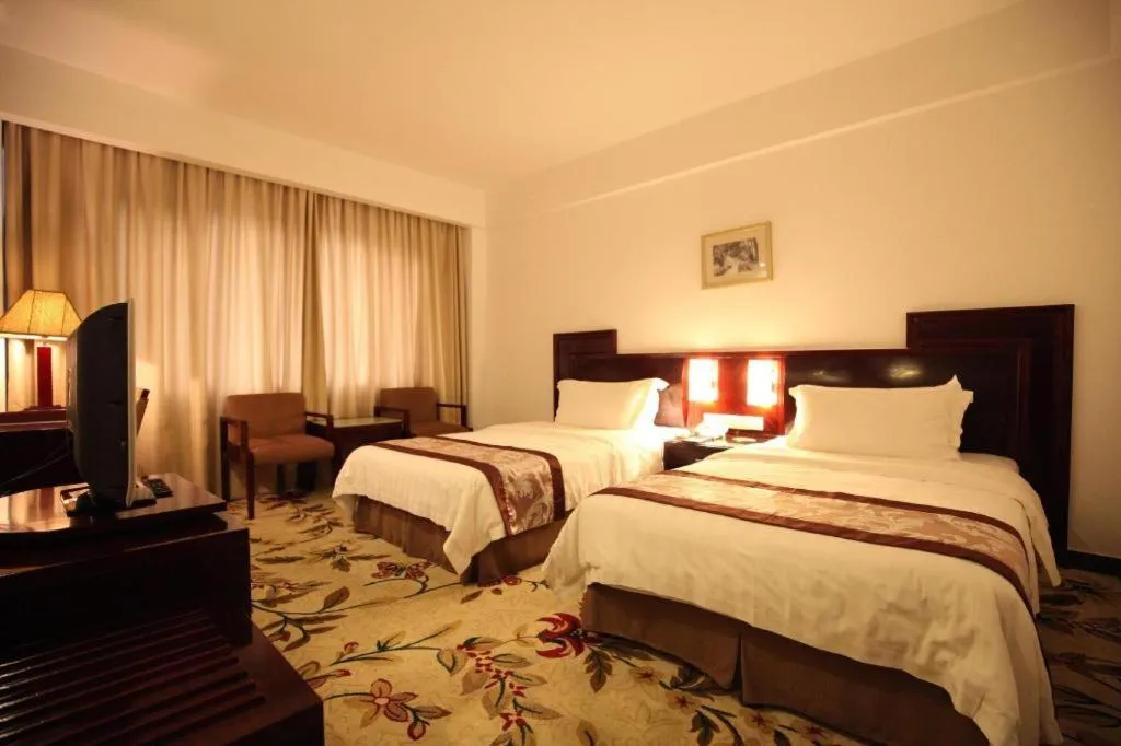 Bed in Hong Ye Hotel