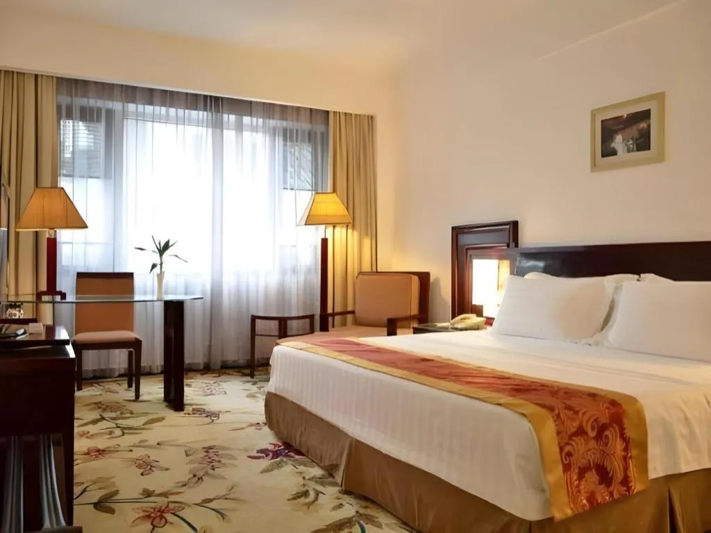 Bed in Hong Ye Hotel