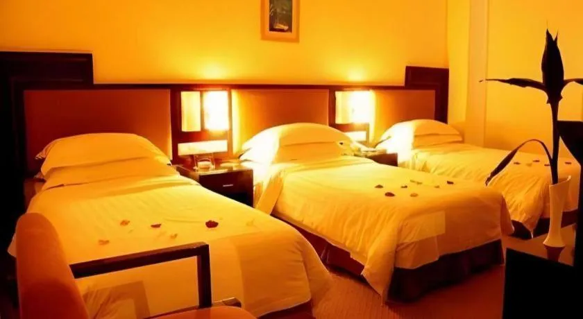 Bed in Hong Ye Hotel