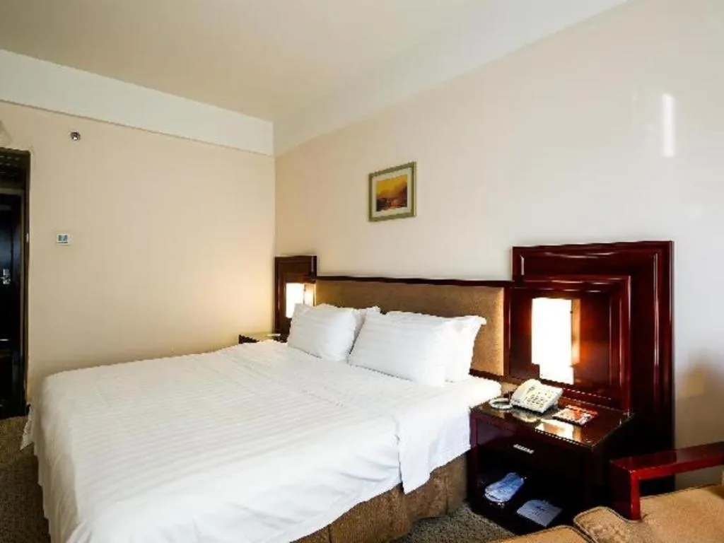 Bed in Hong Ye Hotel