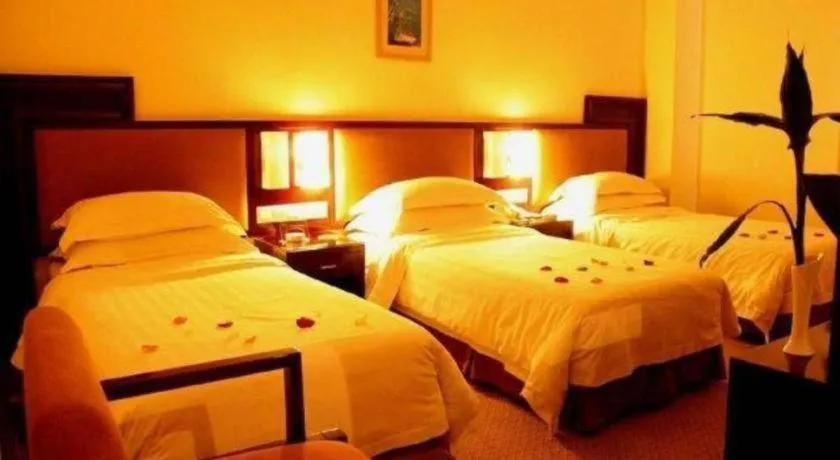 Bed in Hong Ye Hotel