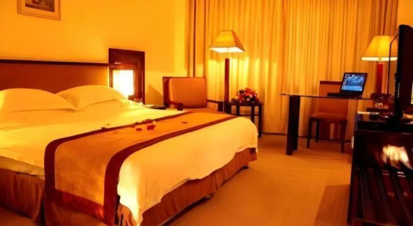 Bed in Hong Ye Hotel