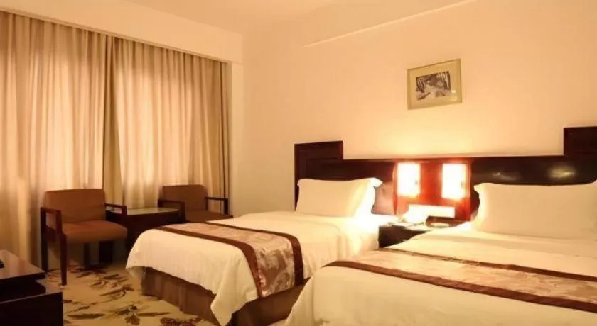 Bed in Hong Ye Hotel