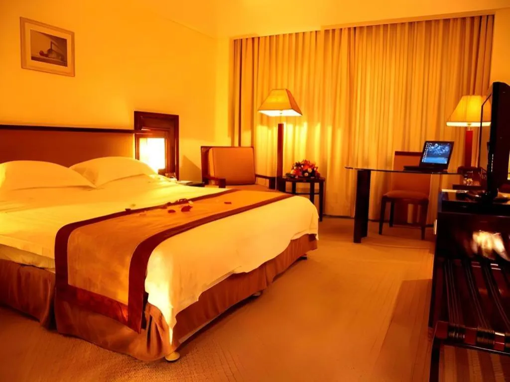 Bed in Hong Ye Hotel