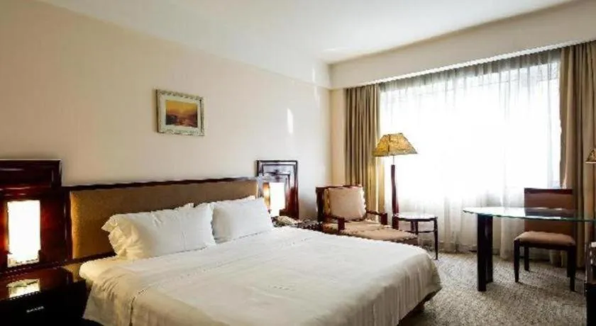 Bed in Hong Ye Hotel